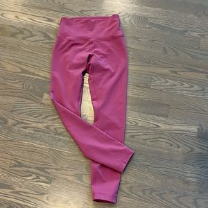 Excellent condition!  Lululemon wunder under 25” in dusty rose !